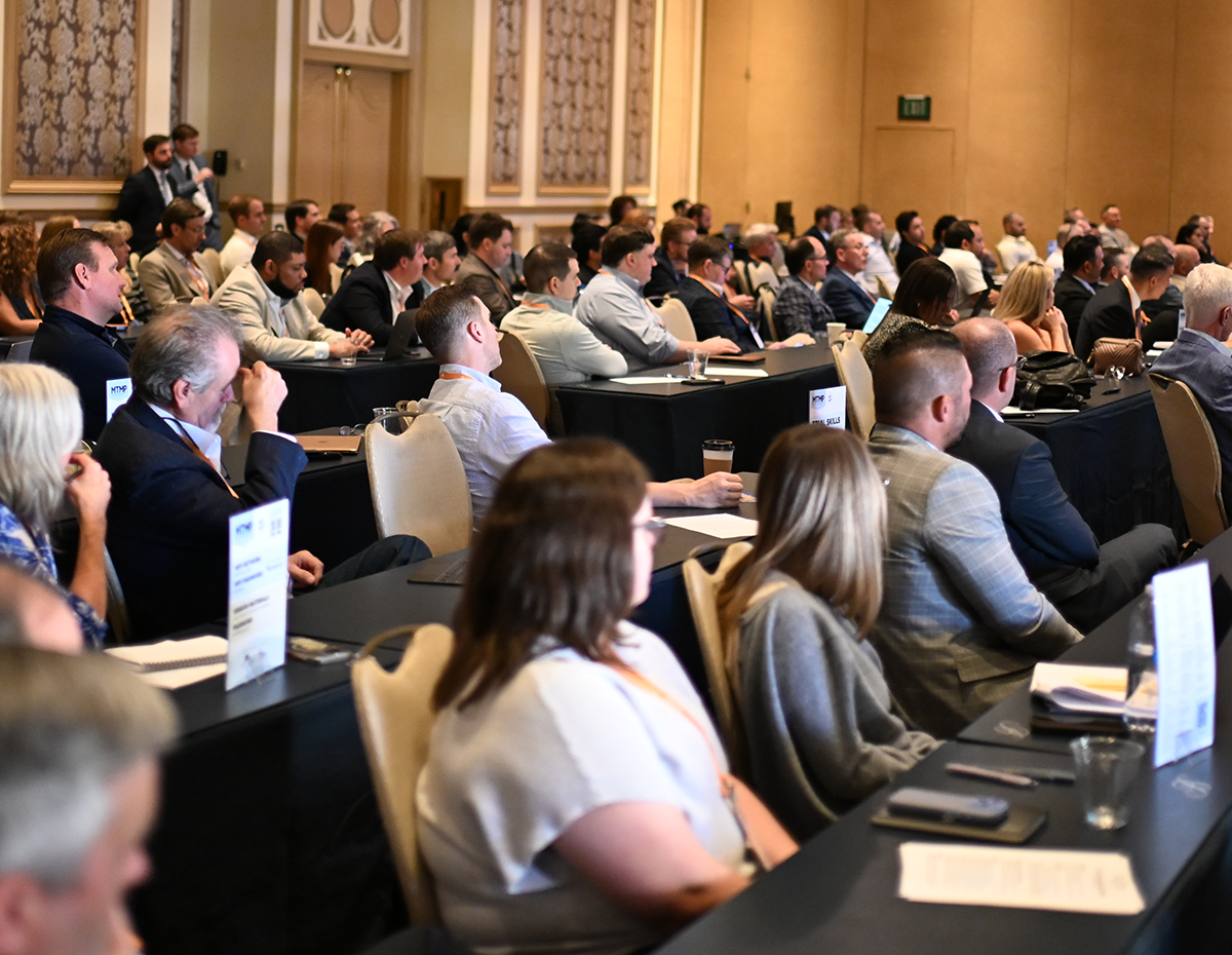 MTMP Conference audience watching a session.